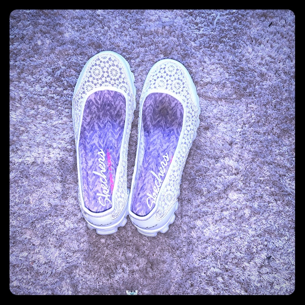 Off White Lace pattern slip on shoes by Skechers